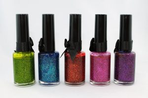 Four different colors of nail polish